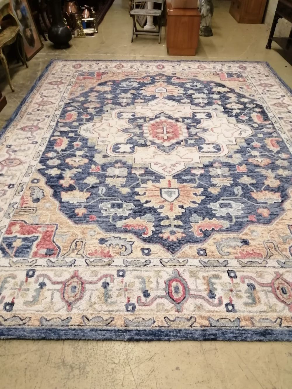 An Indian Eastern jewel wool carpet made for Trago, London 305 x 396cm